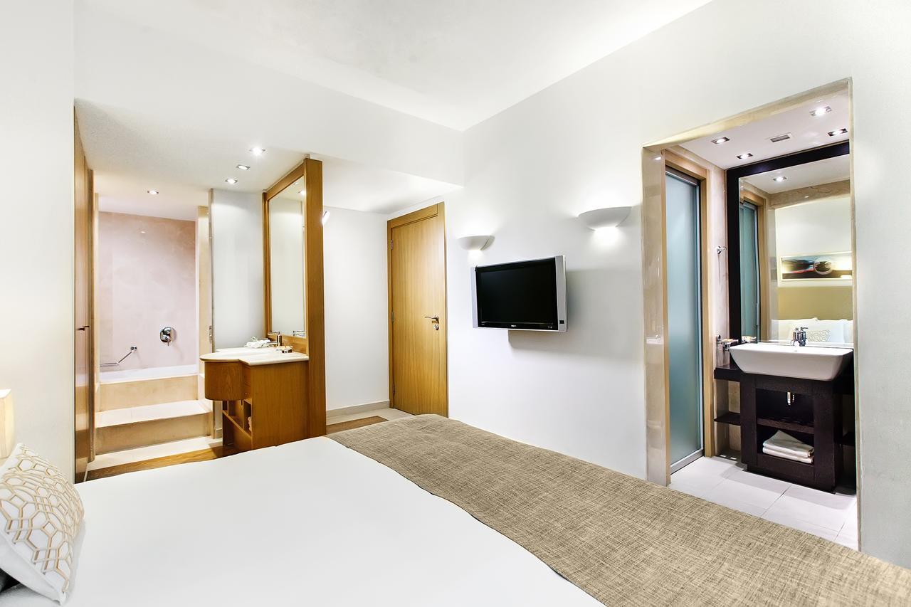 Daios Luxury Living Hotel Thessaloniki Exterior photo A typical room at the hotel