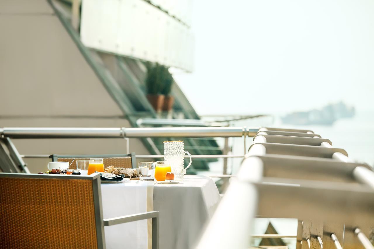 Daios Luxury Living Hotel Thessaloniki Exterior photo The balcony of a stateroom on the A-Rosa Stella