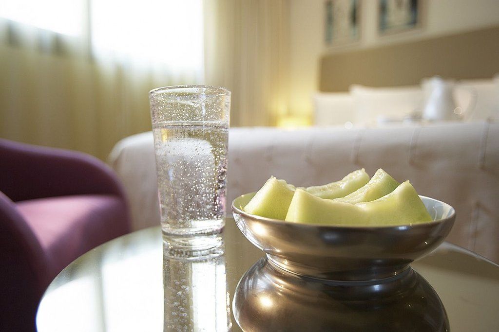 Daios Luxury Living Hotel Thessaloniki Exterior photo A glass of sparkling water